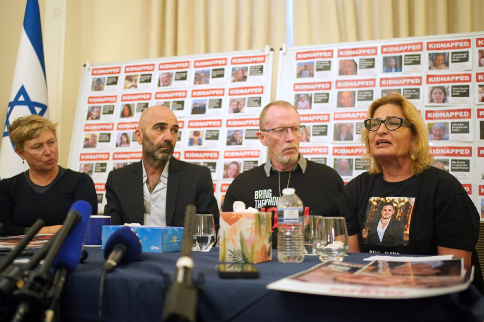 Family members of Israeli hostages who are currently being held in Gaza, Thomas Hand (second right), the father of nine-year-old Irish-Israeli child Emily Hand, Iris Haim (left), the mother of Yotam Haim and Orit Meir (right) the mother of Almog Meir, 21, during a press conference at the Israel Embassy in London (PA)
