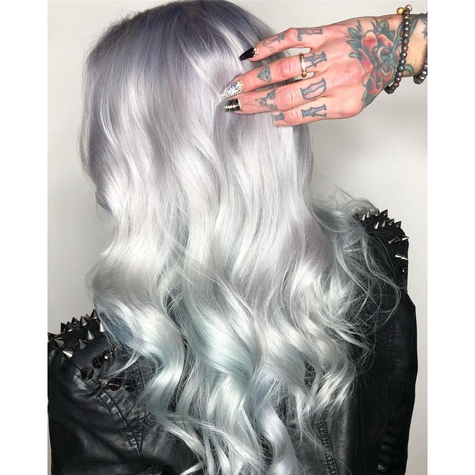 Kansas City colorist Sarai Speer is a key player in the <a rel="nofollow noopener" href="https://www.allure.com/story/ghosted-hair-color-trend?mbid=synd_yahoo_rss" target="_blank" data-ylk="slk:Ghosted hair trend;elm:context_link;itc:0" class="link ">Ghosted hair trend</a>, thanks to looks like this one which combines metallic, iridescent shades and gives off the illusion of various hues depending on where light hits the hair.