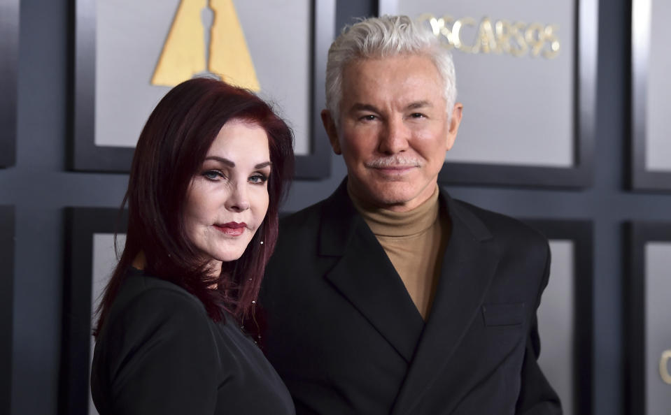 Priscilla Presley, left, and Baz Luhrmann arrive at the Governors Awards on Saturday, Nov. 19, 2022, at Fairmont Century Plaza in Los Angeles. (Photo by Jordan Strauss/Invision/AP)