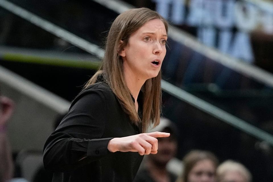 Ashland head coach Kari Pickens reacts during the first half of an NCAA Women's Division 2 championship basketball game against Minnesota Duluth Saturday, April 1, 2023, in Dallas. (AP Photo/Darron Cummings)