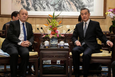 China's Foreign Minister Wang Yi meets for talks with his French counterpart Jean-Yves Le Drian at Diaoyutai State Guesthouse in Beijing, China April 25, 2019. Nicolas Asfouri/Pool via REUTERS