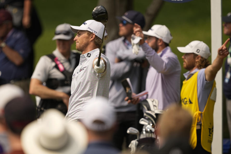 Will Zalatoris watches his tee shot on the 12th hole during the final round of the PGA Championship golf tournament at Southern Hills Country Club, Sunday, May 22, 2022, in Tulsa, Okla. (AP Photo/Matt York)