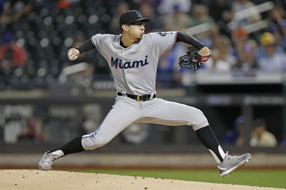 Miami Marlins starting pitcher Robert Dugger winds up during the first inning of the team's baseball game against the New York Mets, Wednesday, Sept. 25, 2019, in New York. (AP Photo/Kathy Willens)