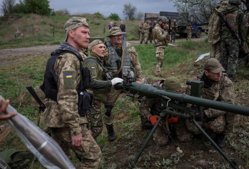 FILE PHOTO: Ukrainian servicemen of the Territorial Defence Forces take part in a training exercise in Dnipropetrovsk region