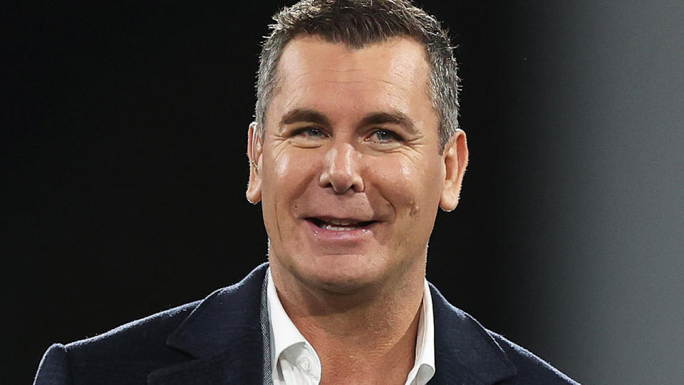 Wayne Carey is pictured prior to broadcasting an AFL match.