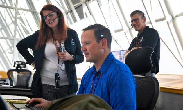 Launch director Charlie Blackwell-Thompson (at left) and launch team members Wes Mosedale and Jeremy Graeber monitor data inside Firing Room 1 at NASA's Kennedy Space Center in Florida during a tanking test.  (NASA Photo / Kim Shiflett)