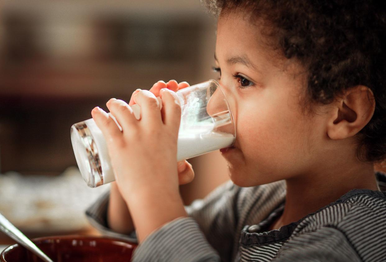 little boy drinking milk