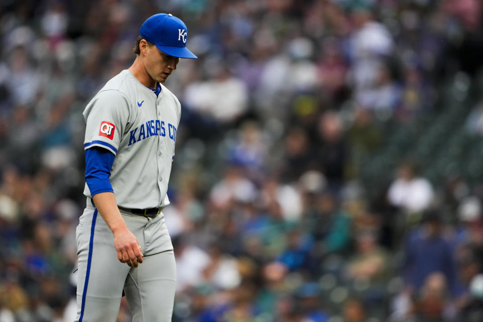 Kansas City Royals starting pitcher Brady Singer walks to the dugout after facing the Seattle Mariners in the first inning of a baseball game Monday, May 13, 2024, in Seattle. (AP Photo/Lindsey Wasson)
