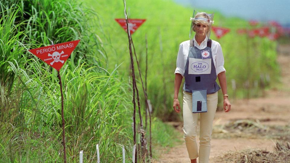 32 of the best Princess Diana Quotes -  Diana walking next to a mine field