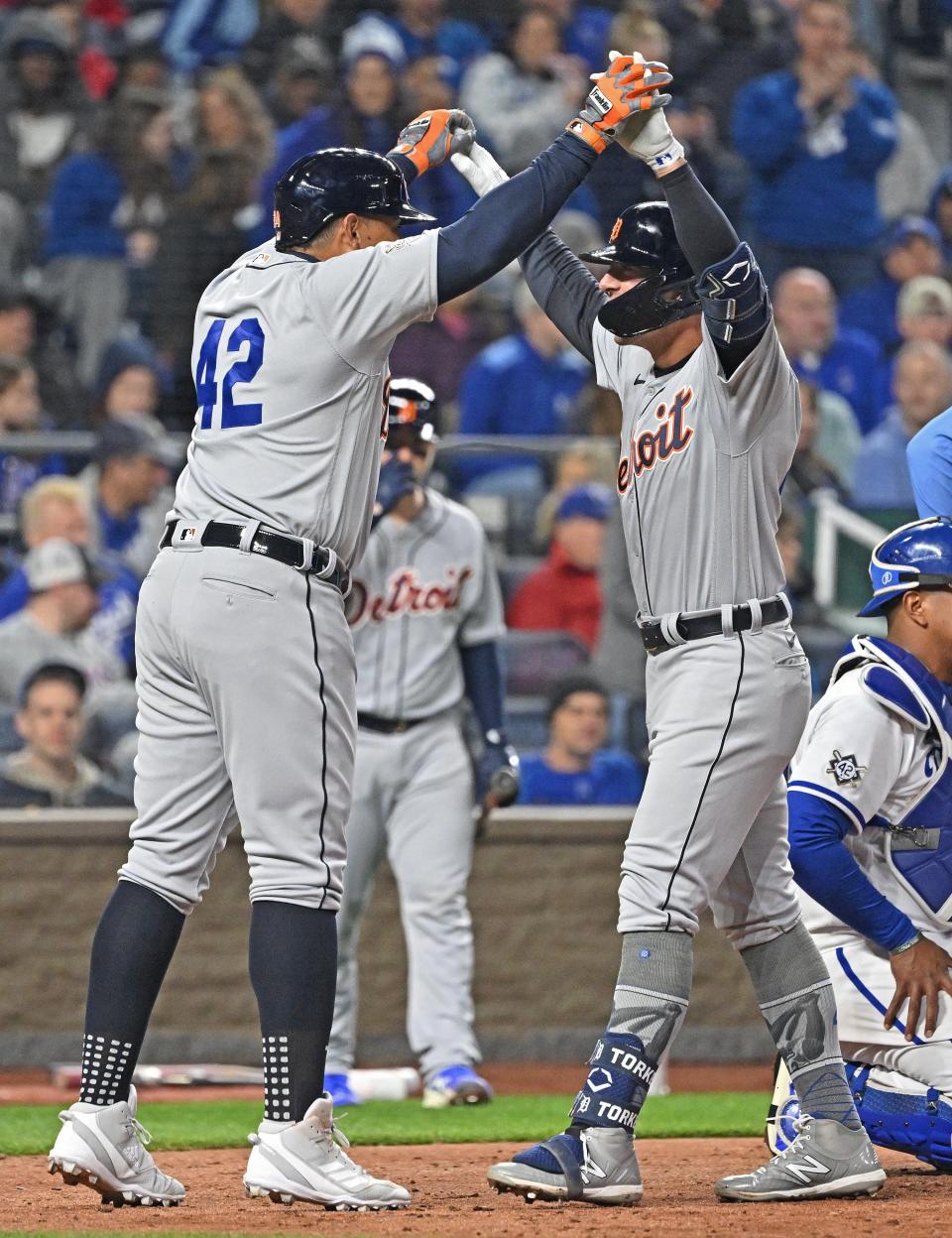 Tigers first baseman Spencer Torkelson (right) celebrates with Miguel Cabrera (left) after hitting a two-run home run during the seventh inning against the Royals at Kauffman Stadium.
