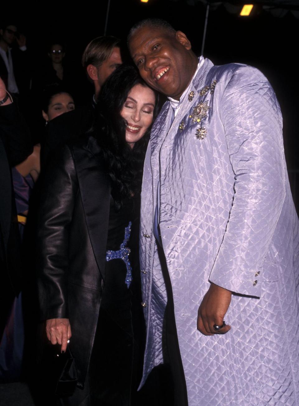 <p>The fashion editor and style icon in a quilted lilac overcoat, accessorised with vintage diamond brooches – and none other than Cher.</p>