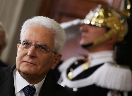 Italian President Sergio Mattarella leaves at the end of his consultations at the Quirinale Palace in Rome, Italy, December 10, 2016. REUTERS/Alessandro Bianchi