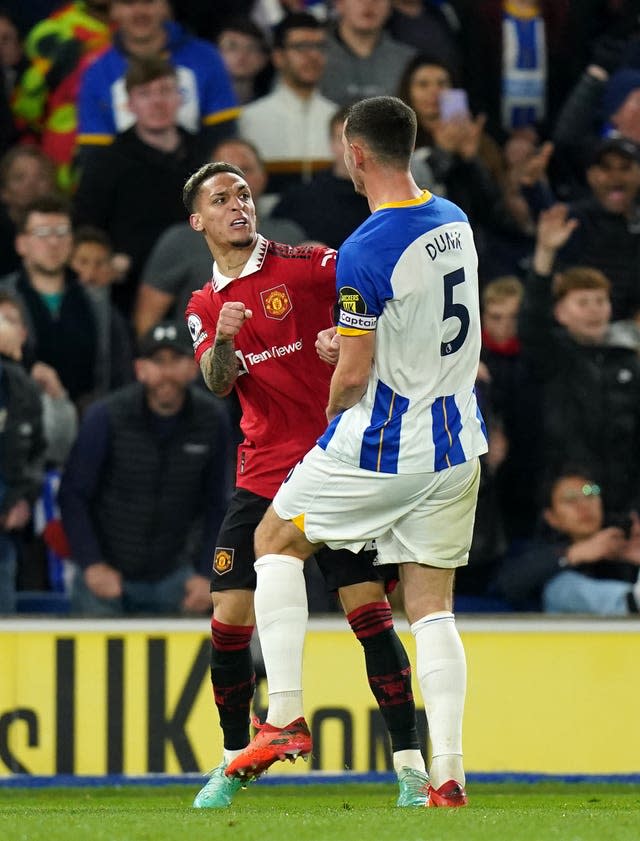 Lewis Dunk confronts Antony after a poor challenge