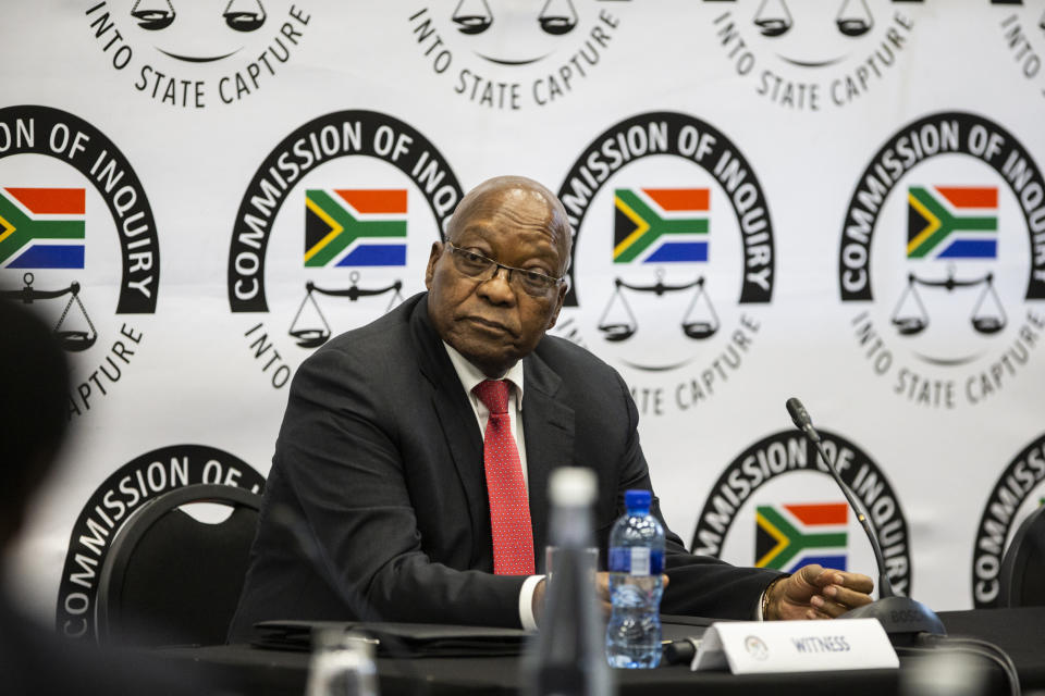 Former South Africa President Jacob Zuma appears before a commission probing allegations of corruption during his tenure as the country's leader as president from 2009 until 2018, in Johannesburg Monday July 15, 2019. Zuma was forced to resign by his ruling African National Congress party over widespread reports of corruption and was replaced by his then deputy Cyril Ramaphosa. (Pool Photo via AP)