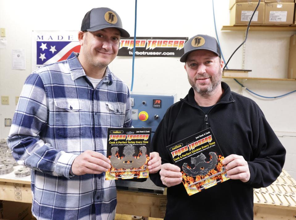 Partners Brian Halasinski,left and Kirk Hyust with their Turbo Trusser product.