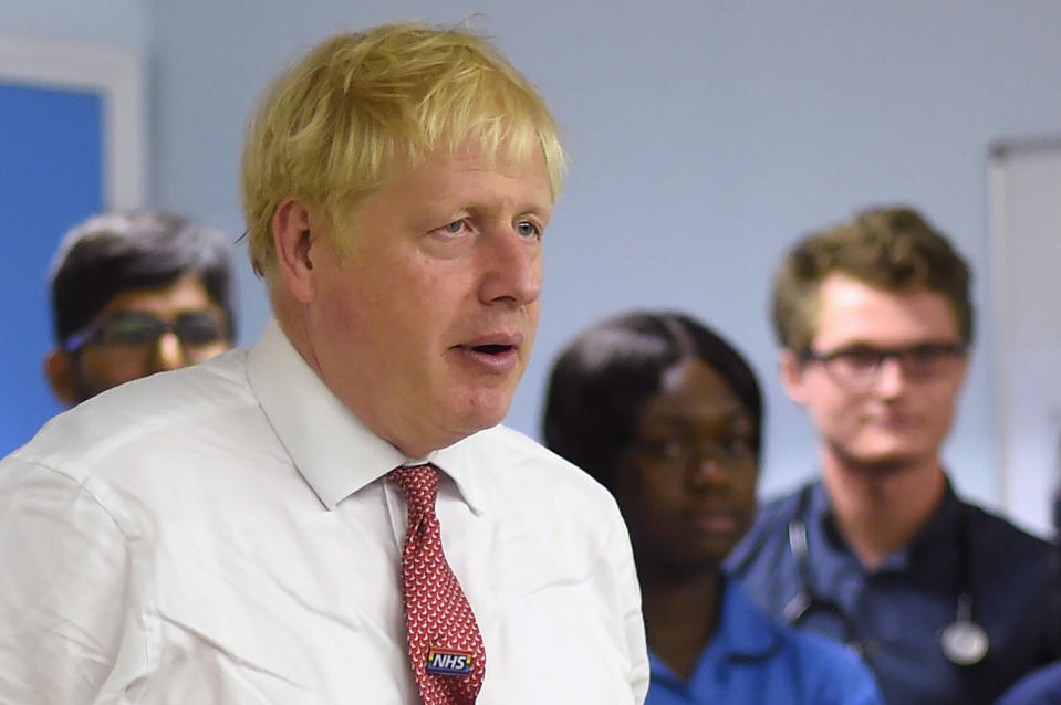 Britain's Prime Minister Boris Johnson speaks to nurses and hospital workers during his visit to Watford General hospital in Watford, north of London on on October 7, 2019. - British Prime Minister Boris Johnson has warned French President Emmanuel Macron he will not delay Brexit beyond October 31, underlining that his latest proposals are a last chance to reach a deal, a Downing Street spokesman said on Sunday. (Photo by Peter Summers / POOL / AFP) (Photo by PETER SUMMERS/POOL/AFP via Getty Images)