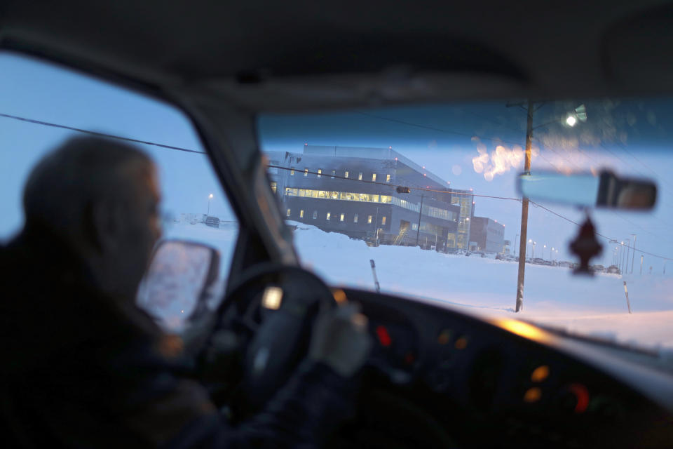 In this Feb. 21, 2019, photo, the Norton Sound Regional Hospital is seen through a taxi windshield during a storm in Nome, Alaska. The main hospital serving residents in the Bering Strait region is located about a mile from downtown Nome. (AP Photo/Wong Maye-E)