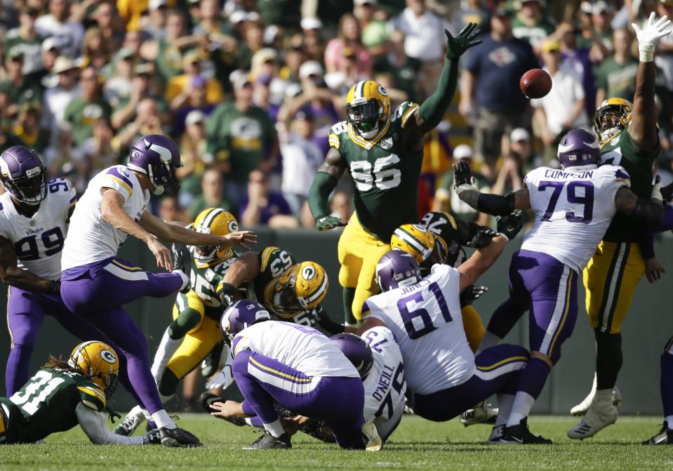 Minnesota Vikings kicker Daniel Carlson misses a field goal in the final sends of overtime an NFL football game against the Green Bay Packers Sunday, Sept. 16, 2018, in Green Bay, Wis. The game ended in a 29-29 tie. (AP Photo/Jeffrey Phelps)