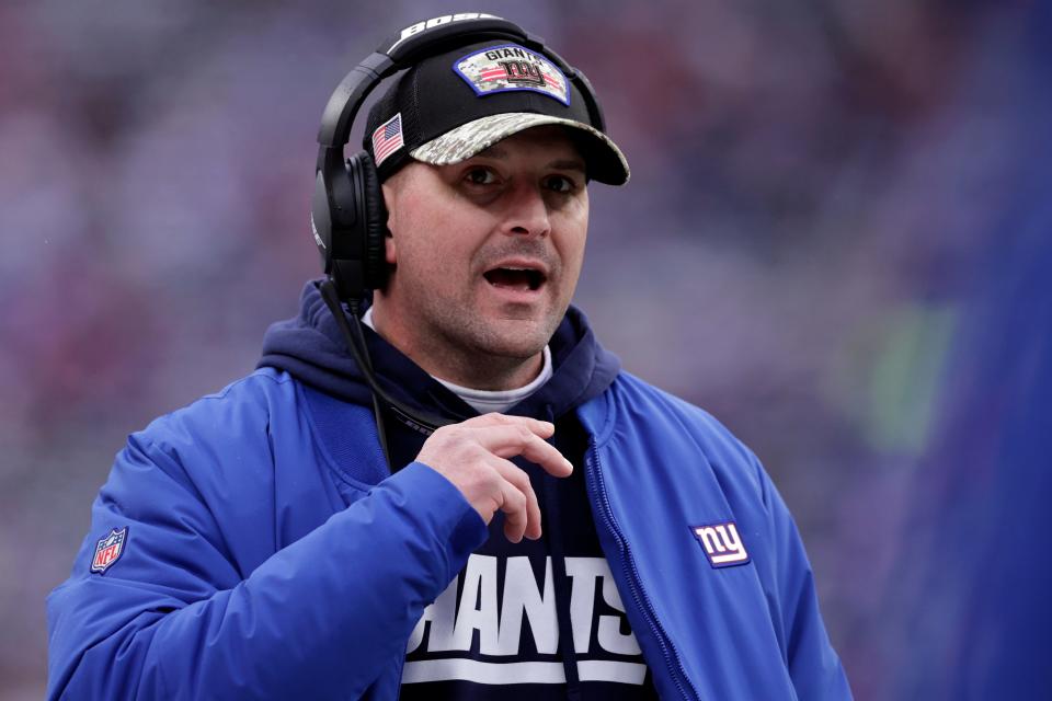 New York Giants head coach Joe Judge talks with members of his team during the game against the Washington Football Team on  Jan. 9 in East Rutherford, N.J.