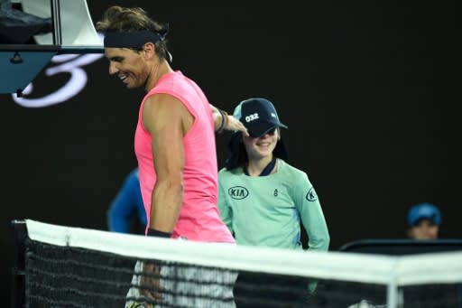 Rafael Nadal kissed a ballgirl after he accidentally struck her with a ball