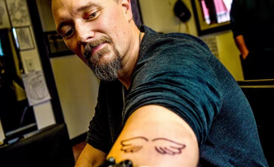 “It’ll be a bond that I’ll have with her forever,” Ben Mogen said about getting a tattoo that matches his daughter Maddie Mogen’s tattoo Thursday at Feel Good Ink in Spokane Valley. Maddie was one of four University of Idaho students killed in an off-campus home in November.