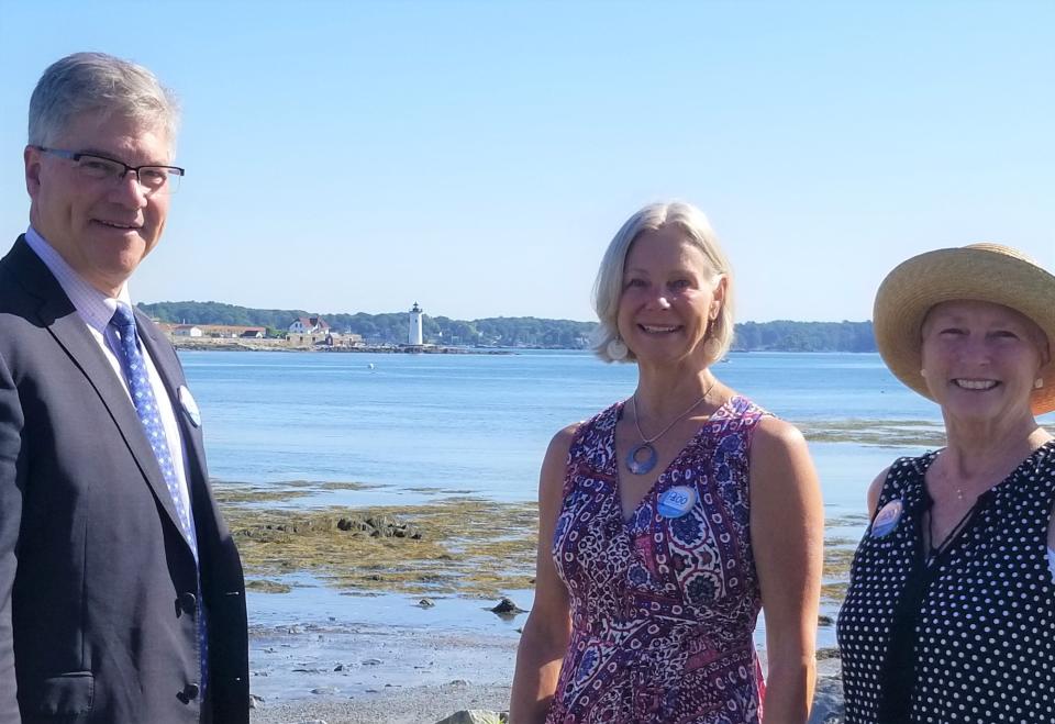 Bank of America New Hampshire State President Ken Sheldon joins Portsmouth400 Community Engagement Officer Susan Labrie and Portsmouth400 Managing Director Valerie Rochon with the PNH symbol, Portsmouth Harbor Light, in view to celebrate the bank as Portsmouth400 Lightkeeper sponsor.
