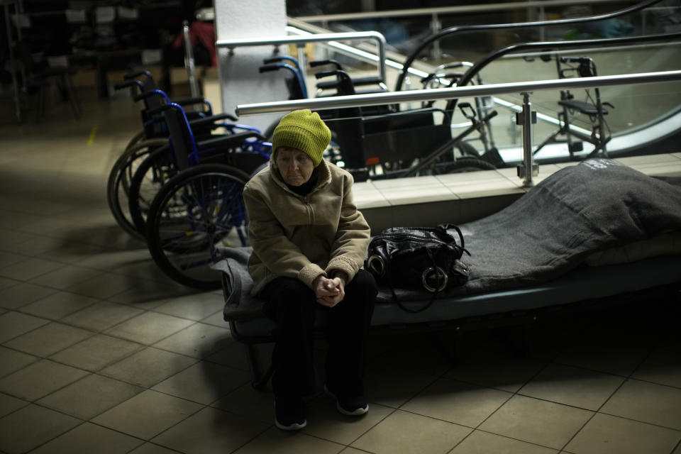 Lyudmyla Doroshenko rests in a reception center for displaced people in Dnipro, Ukraine, Thursday, April 28, 2022. (AP Photo/Francisco Seco)