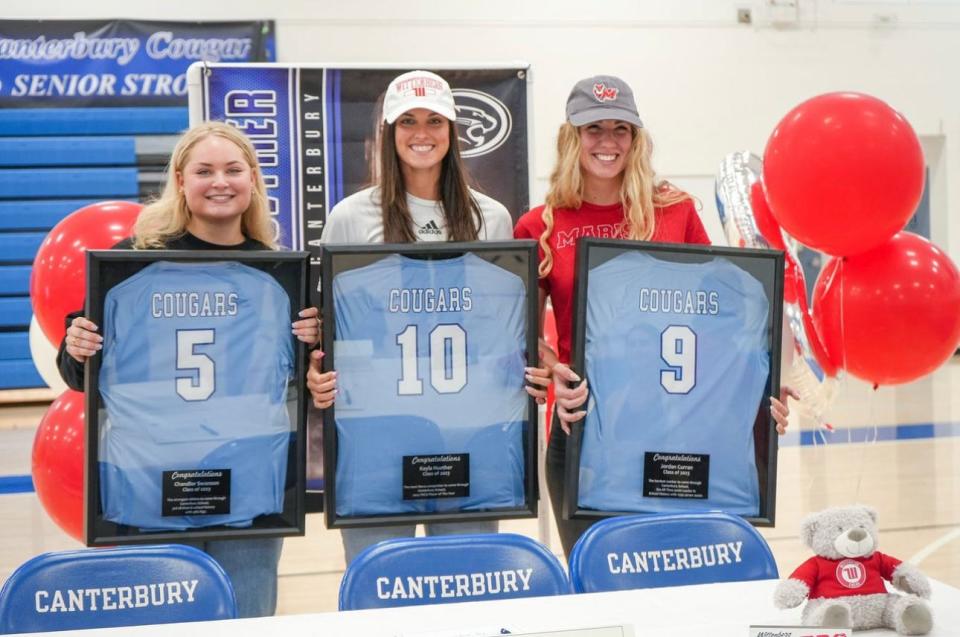 Canterbury volleyball players Chandler Swanson (left), Kayla Huether (center), and Jordan Curran (right) pose for a picture on Thursday, April 27th, 2023.