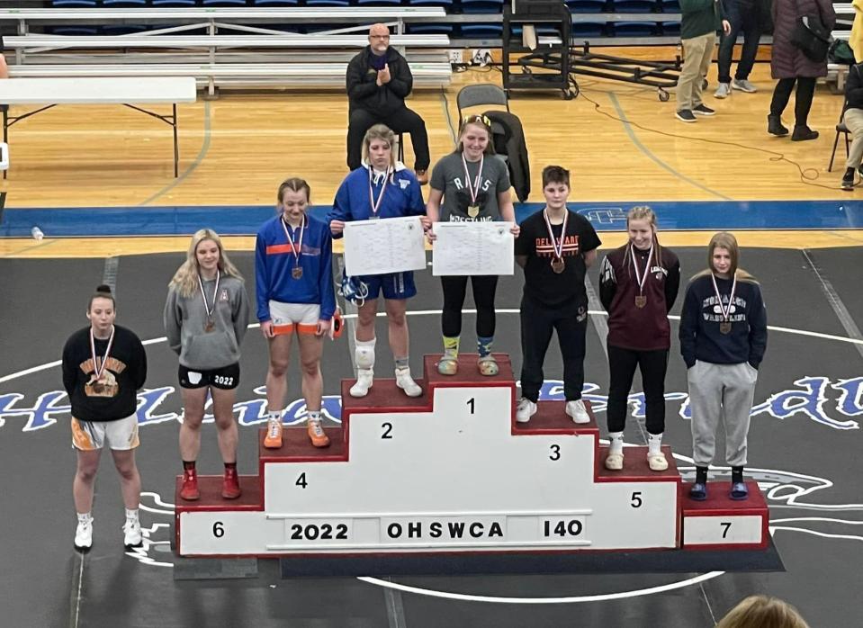 Madison's Lyndsee Young stands atop the podium of the 140-pound weight class at Sunday's OHSWCA girls wrestling state championship meet.