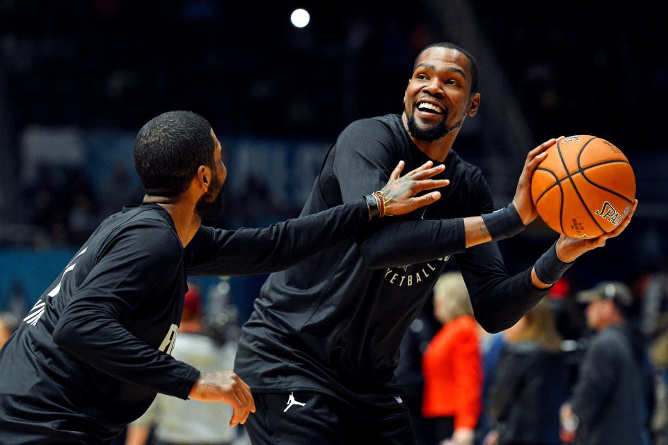 Feb 16, 2019; Charlotte, NC, USA; Team Lebron forward Kevin Durant of the Golden State Warrior (35) handles the ball against Team Lebron guard Kyrie Irving of the Boston Celtics (11) during NBA All-Star Game practice at the Bojangles Coliseum. Mandatory Credit: Bob Donnan-USA TODAY Sports