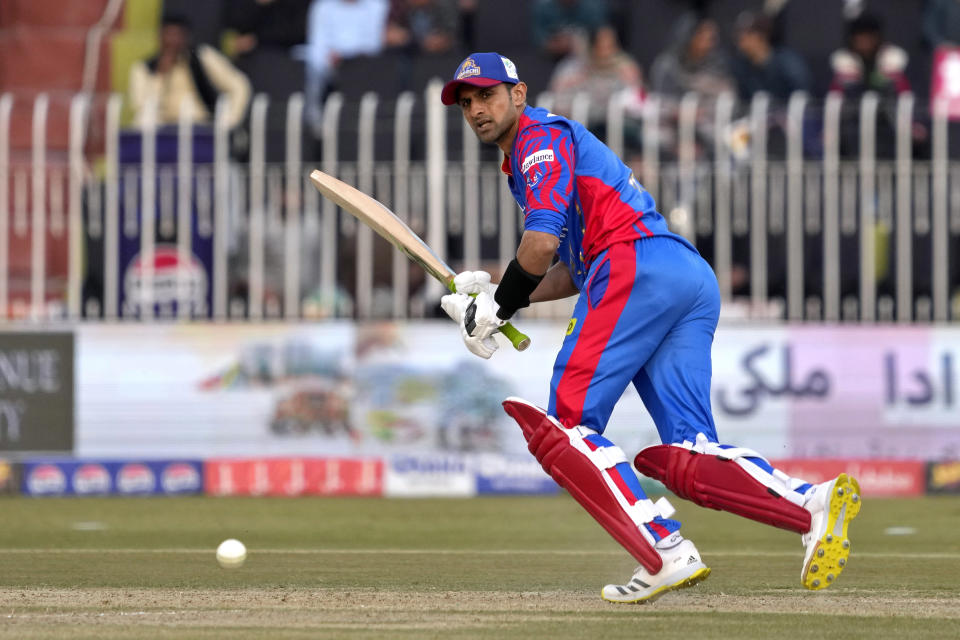 Karachi Kings' Shoaib Malik plays a shot during the Pakistan Super League T20 cricket match between Karachi Kings and Quetta Gladiators, in Rawalpindi, Pakistan, Wednesday, March 6, 2024. (AP Photo/Anjum Naveed)