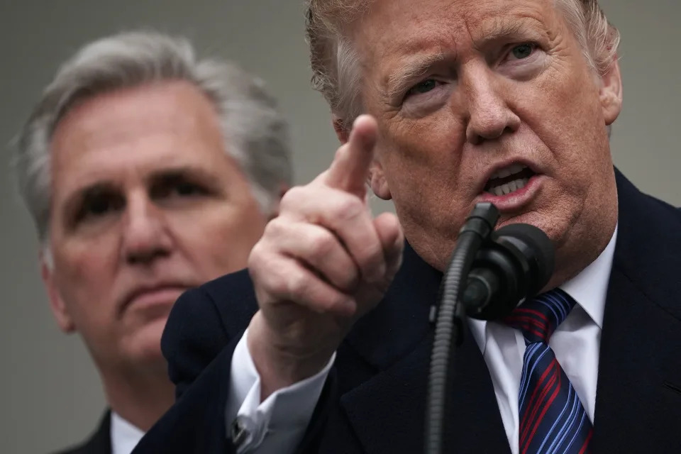 President Donald Trump speaks in 2019 as House Minority Leader Kevin McCarthy looks on.