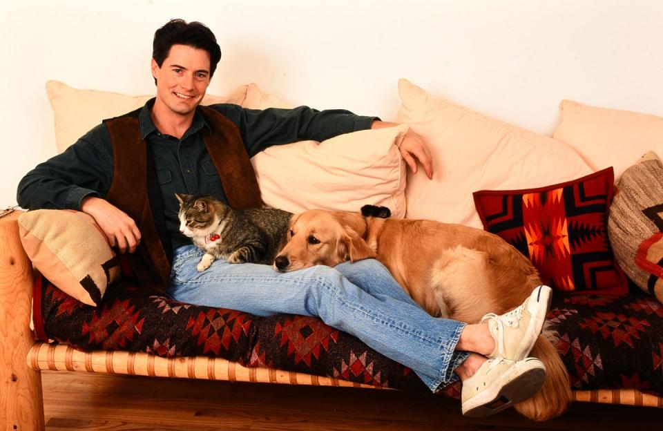 <p>Kyle MacLachlan with his pets in 1991.</p>