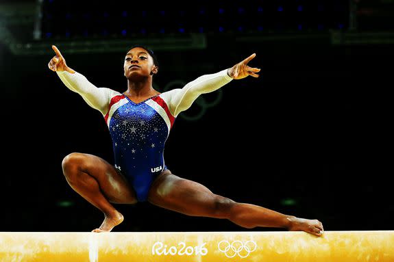 RIO DE JANEIRO, BRAZIL - AUGUST 11: Simone Biles of the United States competes on the balance beam during the Women's Individual All Around Final on Day 6 of the 2016 Rio Olympics at Rio Olympic Arena on August 11, 2016 in Rio de Janeiro, Brazil. (Photo by Alex Livesey/Getty Images)