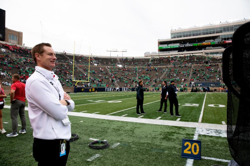 John Cunningham, University of Cincinnati athletic director, looks on before the NCAA football game between the Cincinnati Bearcats and the Notre Dame Fighting Irish on Saturday, Oct. 2, 2021, at Notre Dame Stadium in South Bend, Ind. 