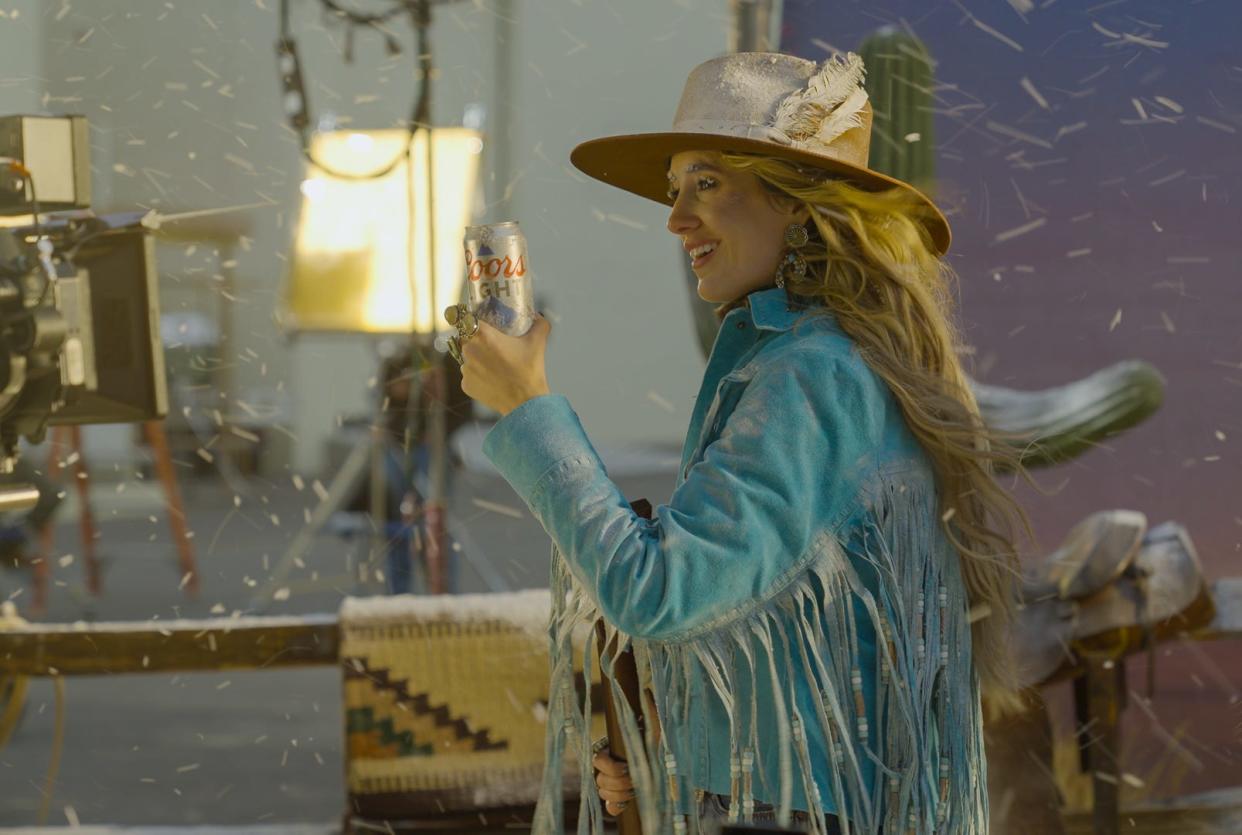 Lainey Wilson shooting her Coors Light commercial for Super Bowl 58.