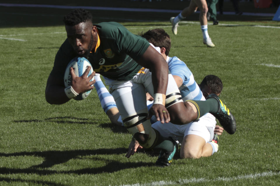 Siya Kolisi of South Africa, scores a try during a rugby Championship match against Argentina in Mendoza, Argentina, Saturday, Aug. 25, 2018. (AP Photo/Gonzalo Prados)