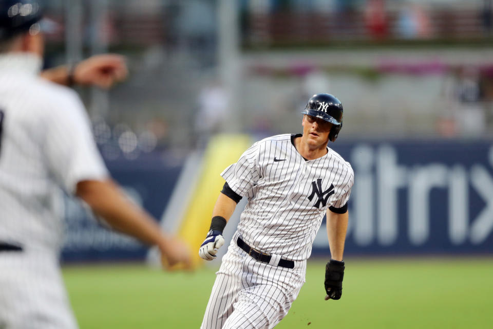 SAN DIEGO, CA - OCTOBER 07:  DJ LeMahieu #26 of the New York Yankees rounds third base to score a run in the fifth inning during Game 3 of the ALDS between the New York Yankees and the Tampa Bay Rays at Petco Park on Wednesday, October 7, 2020 in San Diego, California. (Photo by Alex Trautwig/MLB Photos via Getty Images)