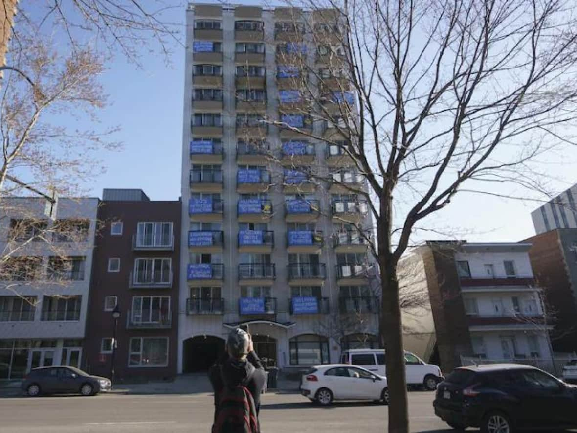 The 14-storey building across from La Fontaine park will be turned into affordable housing after being bought by Interloge. (Ivanoh Demers/Radio-Canada - image credit)