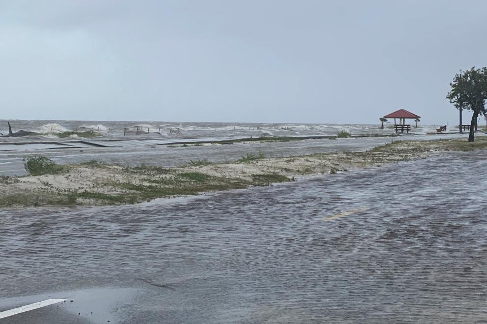 Highway 90 westbound in Pass Christian, Miss. overflows with flooding waters early as a result of the arrival of Hurricane Ida on Sunday, Aug. 29, 2021. (Hunter Dawkins/The Gazebo Gazette via AP) (AP)