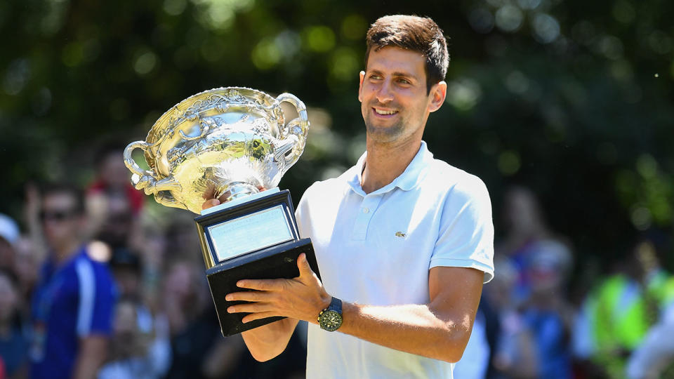 Djokovic posing with his seventh Australian Open trophy on Monday. Pic: Getty