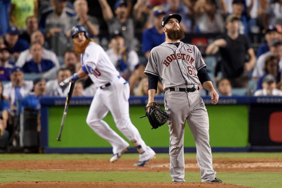 <p>Dallas Keuchel #60 of the Houston Astros reacts after allowing a two-run home run to Justin Turner #10 of the Los Angeles Dodgers during the sixth inning in game one of the 2017 World Series at Dodger Stadium on October 24, 2017 in Los Angeles, California. (Photo by Kevork Djansezian/Getty Images) </p>