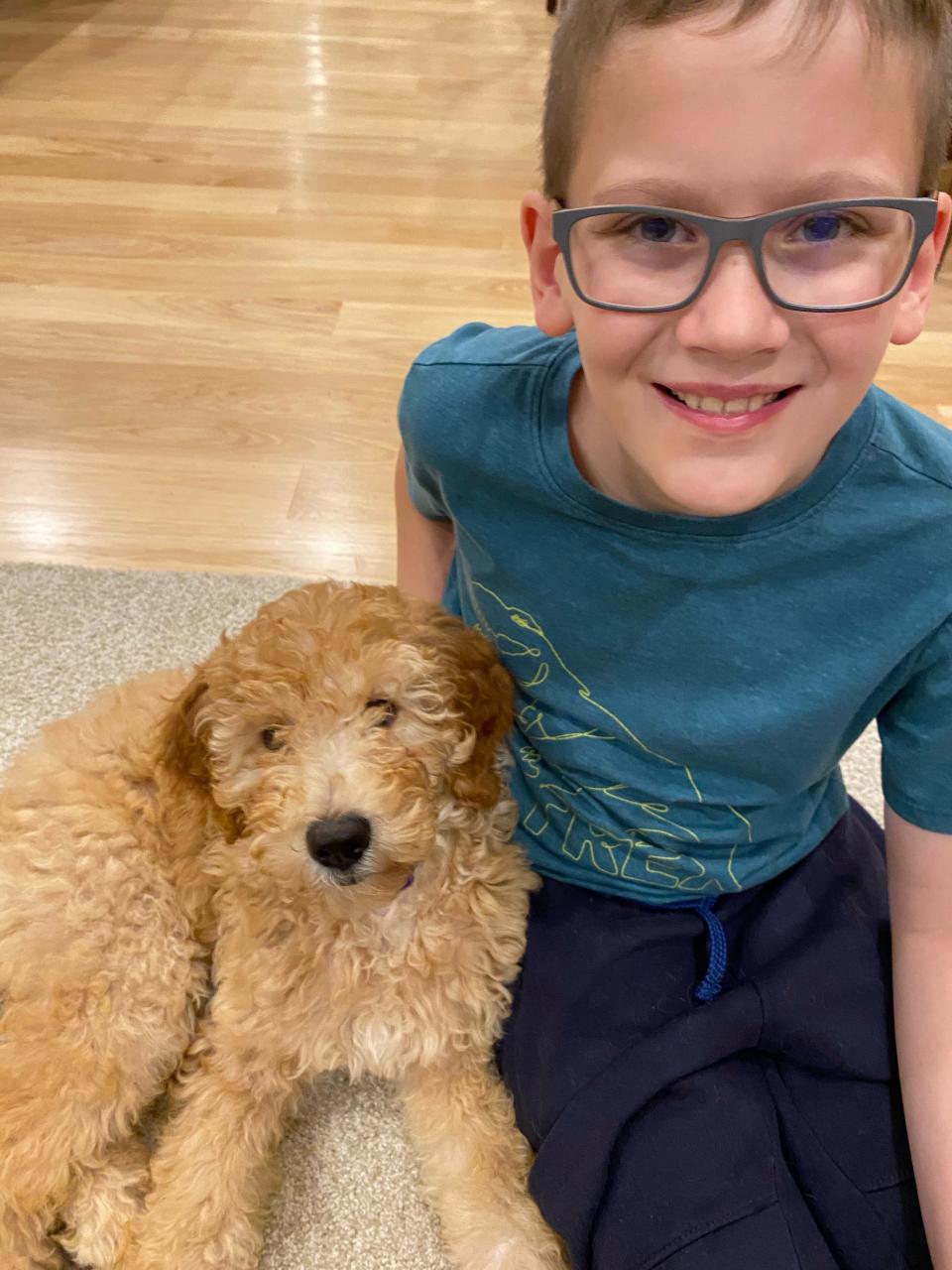 When not working on projects at his school, STEM Academy in Fond du Lac, 9-year-old Owen Wild enjoys spending time with his new puppy, Maggie.