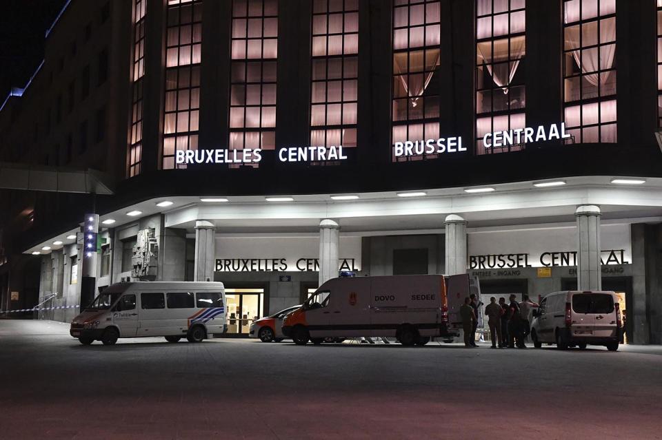 <p>Police investigators and members of the DOVO (bomb clearing squad) work inside Central Station in Brussels after a reported explosion on Tuesday, June 20, 2017. Belgian media are reporting that explosion-like noises have been heard at a Brussels train station, prompting the evacuation of a main square. (Vanden Wijngaert/AP) </p>