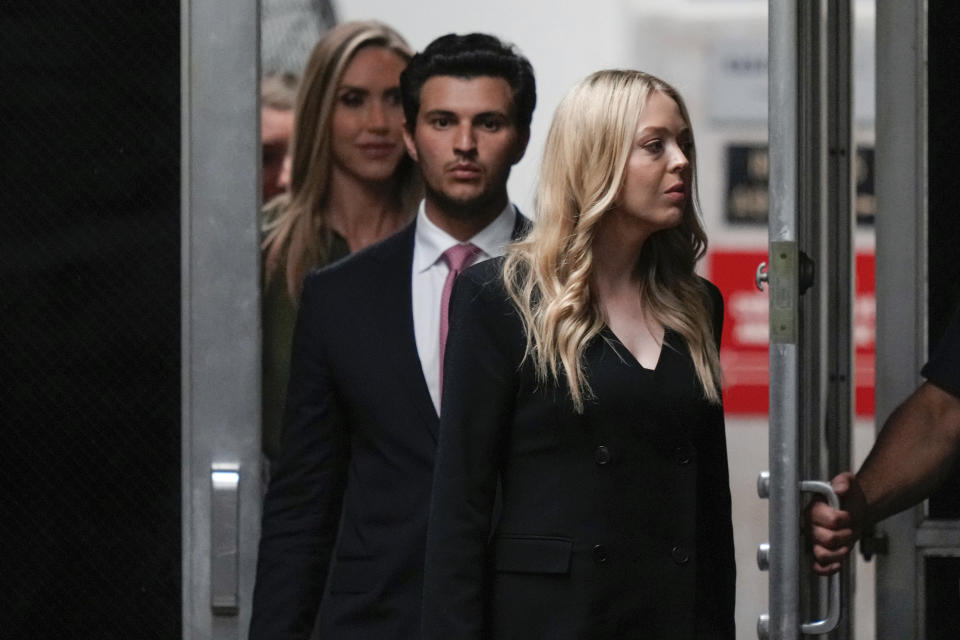 Tiffany Trump, Michael Boulos and Lara Trump return from a break at Manhattan Criminal Court, Tuesday, May 28, 2024, in New York. (AP Photo/Julia Nikhinson, Pool)