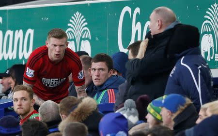 Football Soccer - Everton v West Bromwich Albion - Barclays Premier League - Goodison Park - 13/2/16 West Brom's James McClean clashes with a fan Action Images via Reuters / Carl Recine Livepic