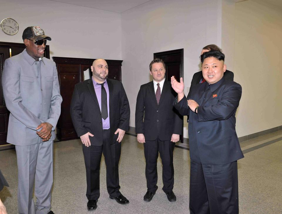 North Korean leader Kim Jong Un talks with Dennis Rodman after they watched a basketball game between former U.S. NBA basketball players and North Korean players of the Hwaebul team of the DPRK at Pyongyang Indoor Stadium