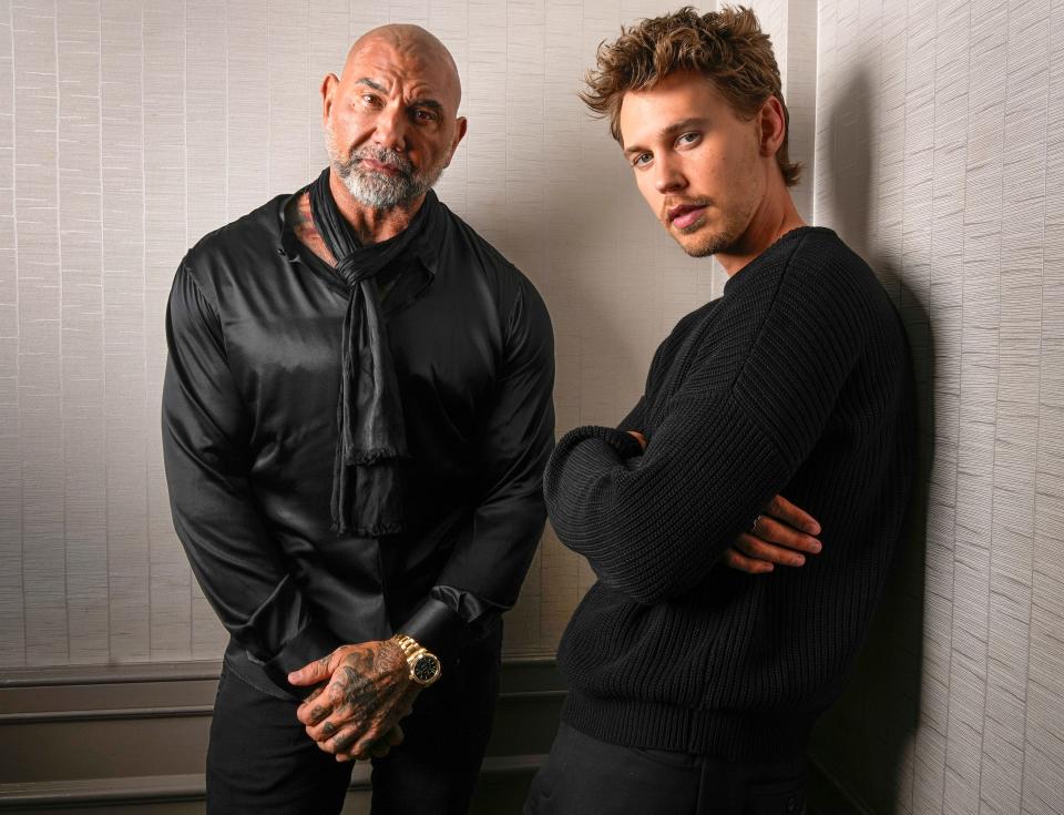 Dave Bautista, left, plays the evil Glossu Rabban Harkonnen and Austin Butler plays his equally evil brother Feyd-Rautha Harkonnen in "Dune: Part Two.”