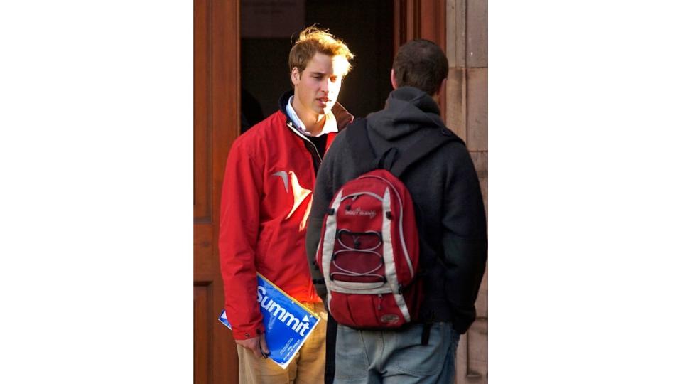 Prince William talking to a fellow student at university