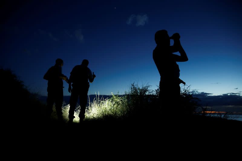 French gendarmes patrol the beach in Wissant